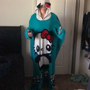 Hello kitty body blanket! Open back for perfect comfort! Has a hood! Used!